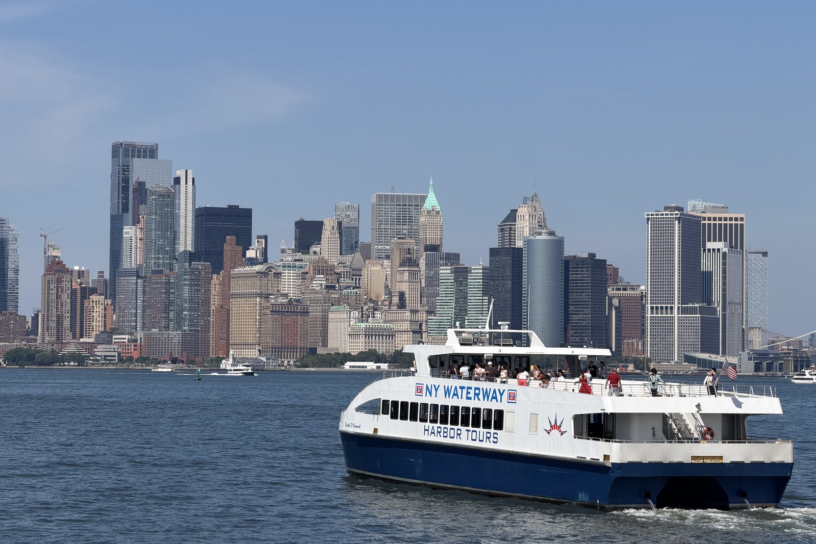 Is everyone leaving New York: Lower Manhattan skyline and NY Waterway ferry, 2025