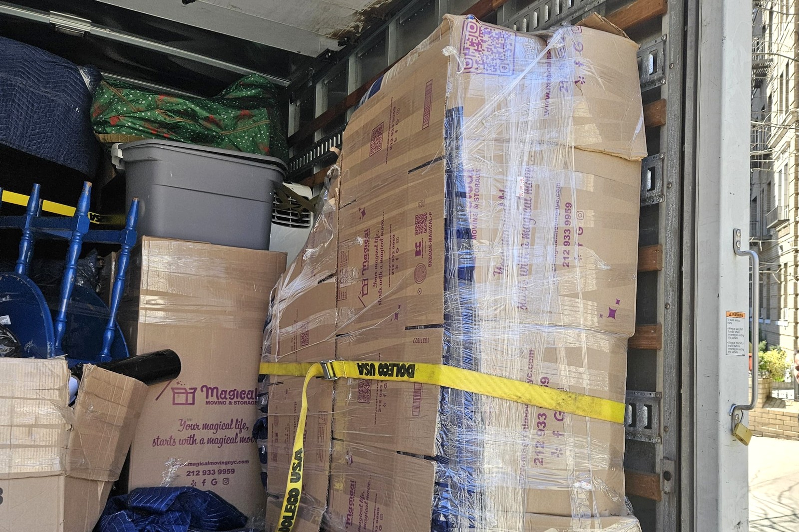 What movers won't move: Magical Moving crew's strapped and blanket-wrapped load inside the truck