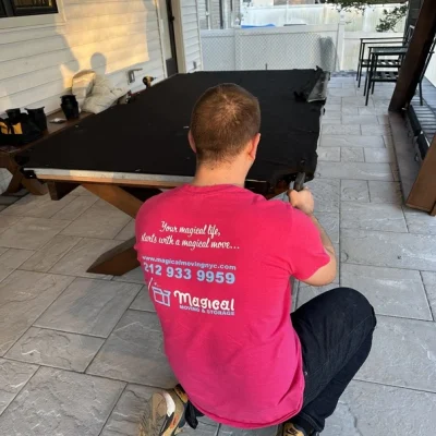 Mover packing pool table for local move in NYC